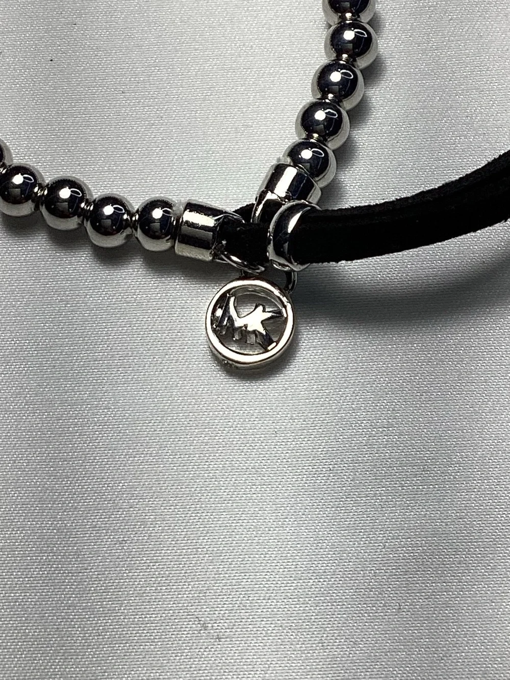 Michael Kors Silver-Tone Beaded Stretch Black Cord Bracelet NWT includes MK Bag